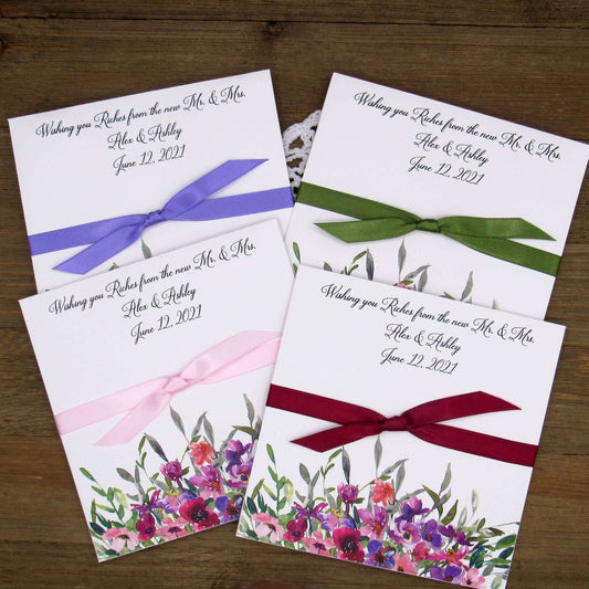 Purple Floral Wedding Guest Favors printed on white card stock with ribbon tied.  Personalized lottery ticket envelope favors, insert an instant lotto ticket for a fun guest favor.