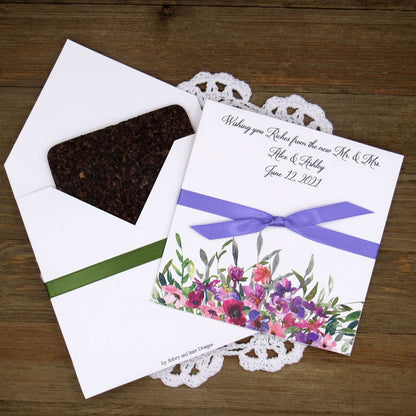 Purple Floral Wedding Guest Favors printed on white card stock with ribbon tied.  Personalized lottery ticket envelope favors, insert an instant lotto ticket for a fun guest favor.