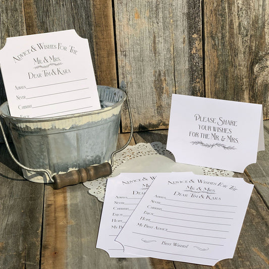 Personalized Wedding Wish Cards displayed in a rustic bucket, perfect for collecting guest advice and wishes.